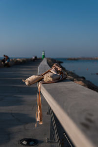 Nautical vessel on sea against clear sky