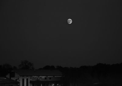 Scenic view of moon against clear sky at night