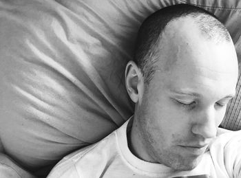 Close-up of boy sleeping on bed