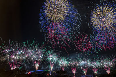 Firework display at night