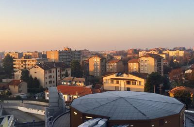 High angle view of townscape against sky at sunset