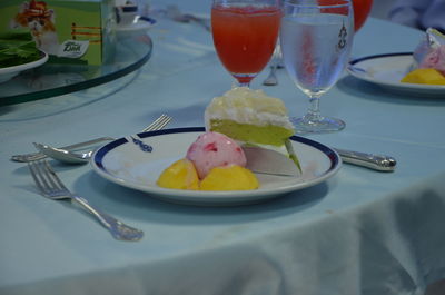 High angle view of fruits in plate on table