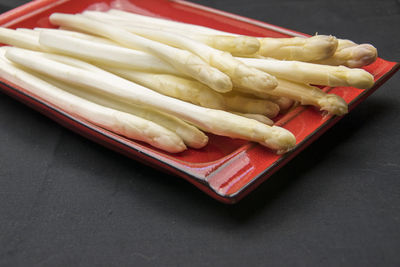 High angle view of vegetables in plate on table