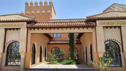 Exterior of temple outside building against clear sky