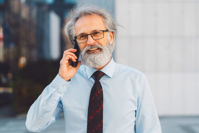 Young man talking on mobile phone