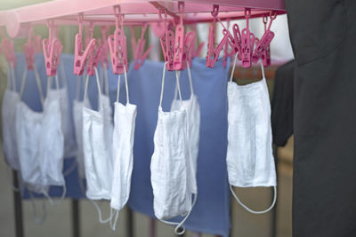 Close-up of clothes hanging on clothesline