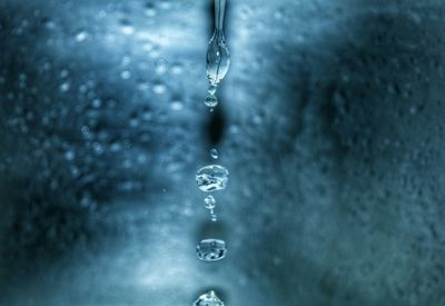 Close-up of water drops on glass