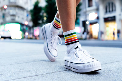 Woman walking over the city