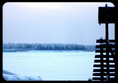 Scenic view of snow covered field