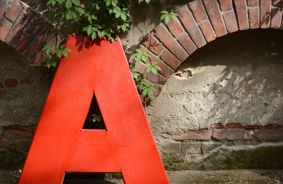 Red umbrella on built structure