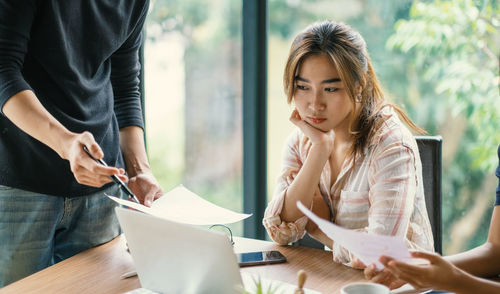 Woman working on table