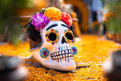 Close-up of decorated human skull
