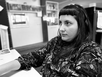 Portrait of young woman looking away