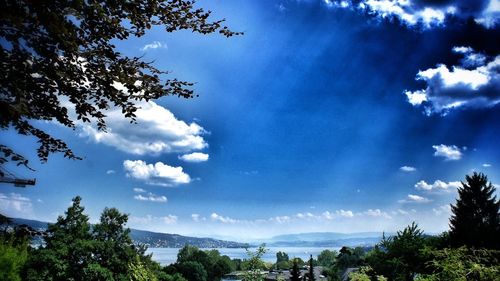 Scenic view of landscape against cloudy sky