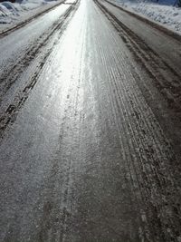 Tire tracks on road in winter