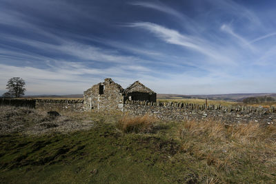 Old building exterior on field