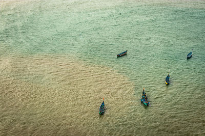 Fishing boats isolated many in deep sea aerial shots