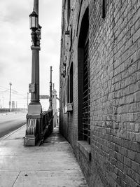 Street amidst buildings against sky