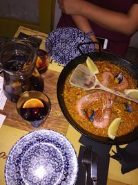 High angle view of woman in plate on table