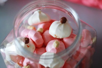 High angle view of meringues in glass jar