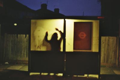 Blurred motion of woman at night