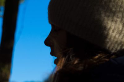 Portrait of man against blue sky