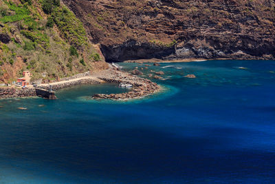 Scenic view of sea and mountains