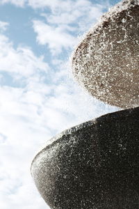 Low angle view of snow against sky