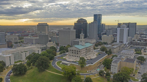 High angle view of buildings against sky during sunset