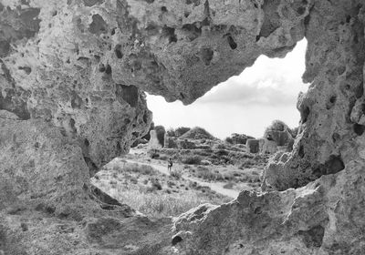 Rock formation on land against sky