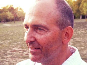 Close-up portrait of man looking away