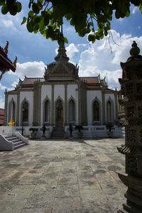 View of historic building against cloudy sky