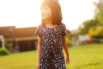 Girl standing on field