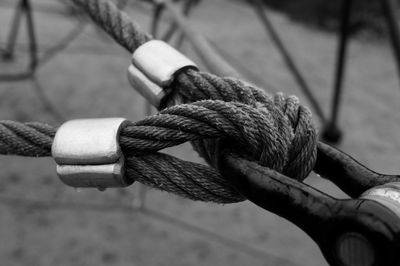 Close-up of rope tied to metal