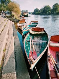 Boats moored at harbor