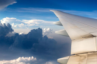 Low angle view of airplane flying in sky