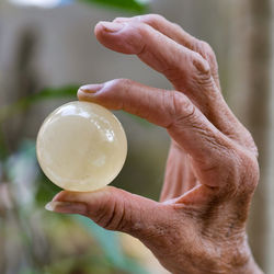 Close-up of man holding ice cream