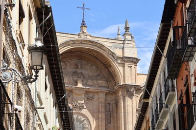 Low angle view of historic building against sky