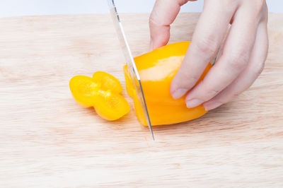 High angle view of person preparing food on table