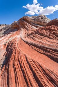 Scenic view of desert against blue sky