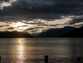 Scenic view of lake against sky during sunset
