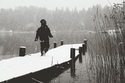 Woman standing in lake