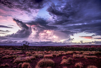 Scenic view of dramatic sky over land