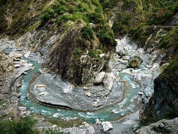 High angle view of rocks in water