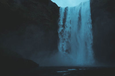 Low angle view of skogafoss