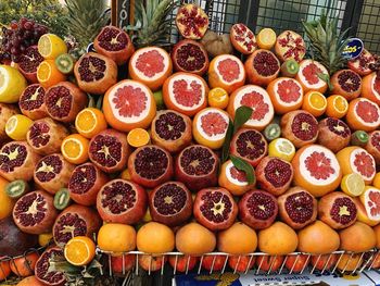 High angle view of orange fruits for sale in market