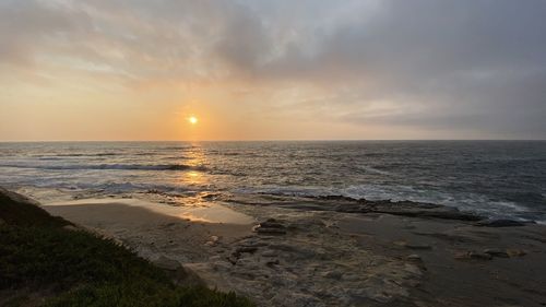Scenic view of sea against sky during sunset