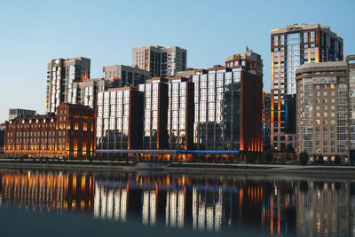 Illuminated buildings in city at night