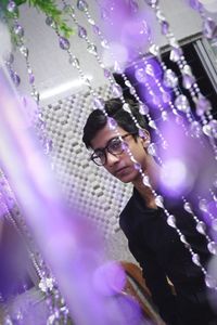 Portrait of young man wearing eyeglasses