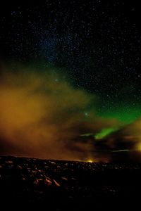 Scenic view of star field against sky at night